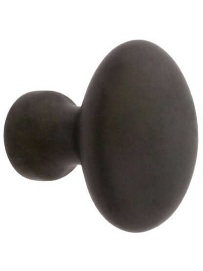 Small Oval Brass Cabinet Knob - 1 inch x 5/8 inch in Oil-Rubbed Bronze.